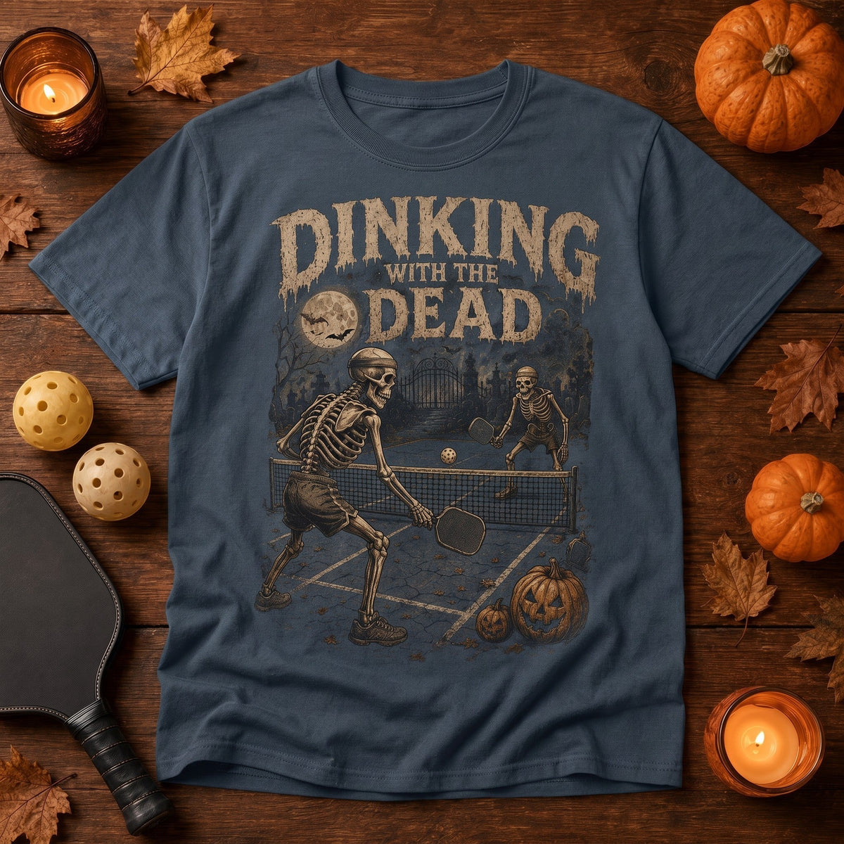 dark grey Halloween pickleball t-shirt with vintage skeleton graphic playing on a moonlit court
