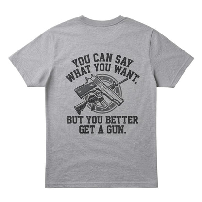  grey cotton t-shirt featuring a back graphic with a gun illustration and bold text.