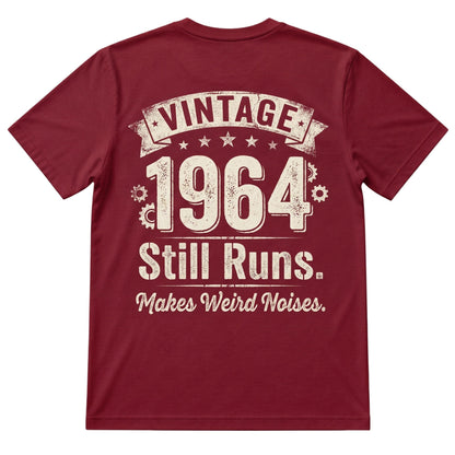  maroon 100% cotton t-shirt featuring a vintage 1964 Still Runs Makes Weird Noises graphic on the back