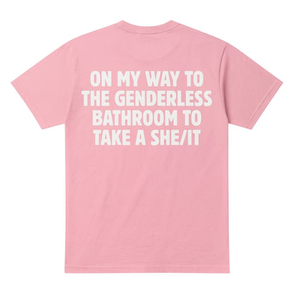 light pink cotton t-shirt featuring bold white text on the back with humorous genderless bathroom slogan.